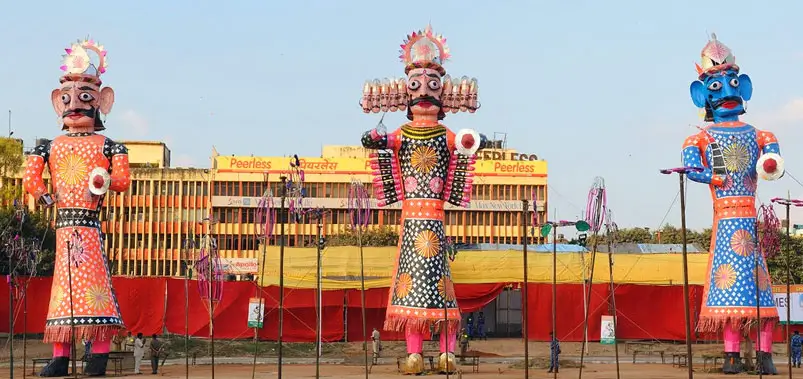 Giant effigies of Ravana and other figures prepared for festival celebrations