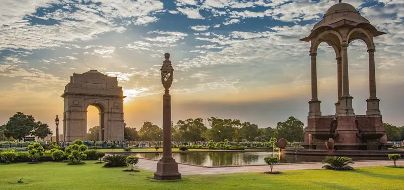 Scenic sunset view of India Gate and the canopy in New Delhi   