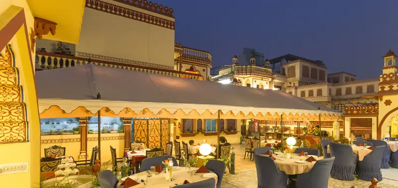 Traditionally illuminated rooftop restaurant during the evening