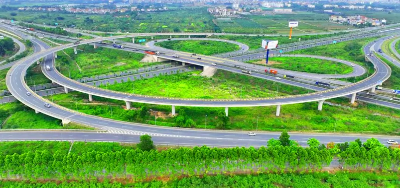 Yamuna Expressway interchange with lush greenery